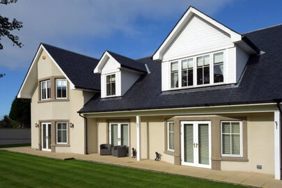 Close-up of a newly tiled pitched roof on a residential property