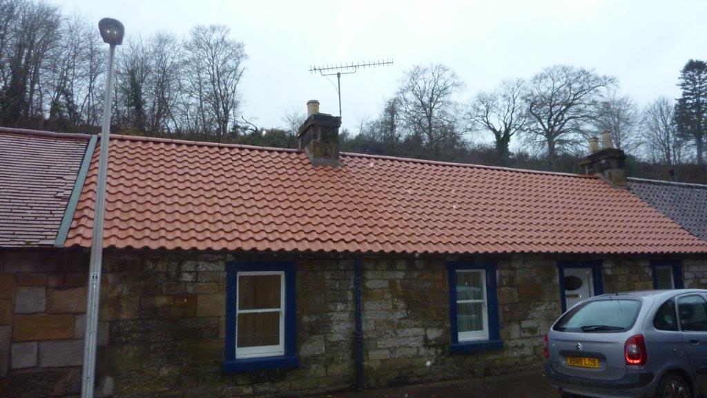 New roof being tiled on a house