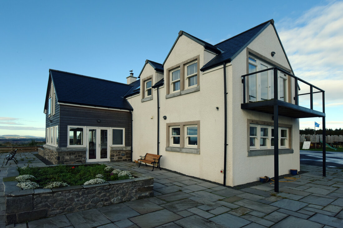 Specialist render and Roof